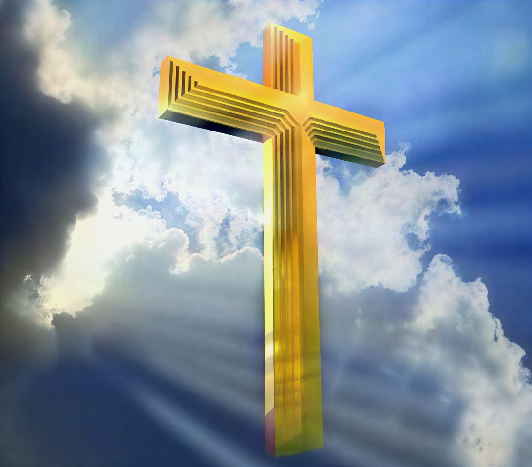 Cross in heavenly light sky