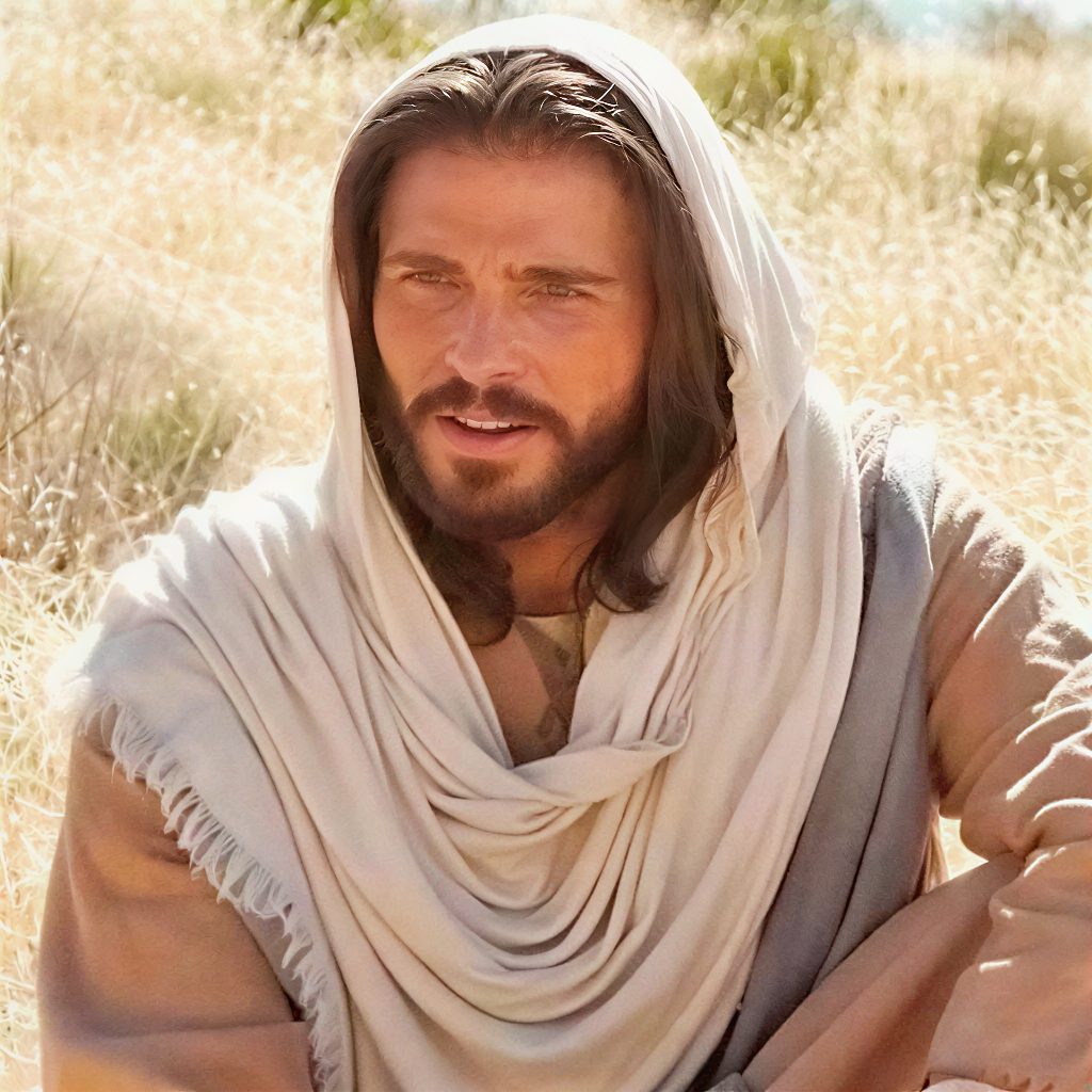 Person in robe sitting outdoors