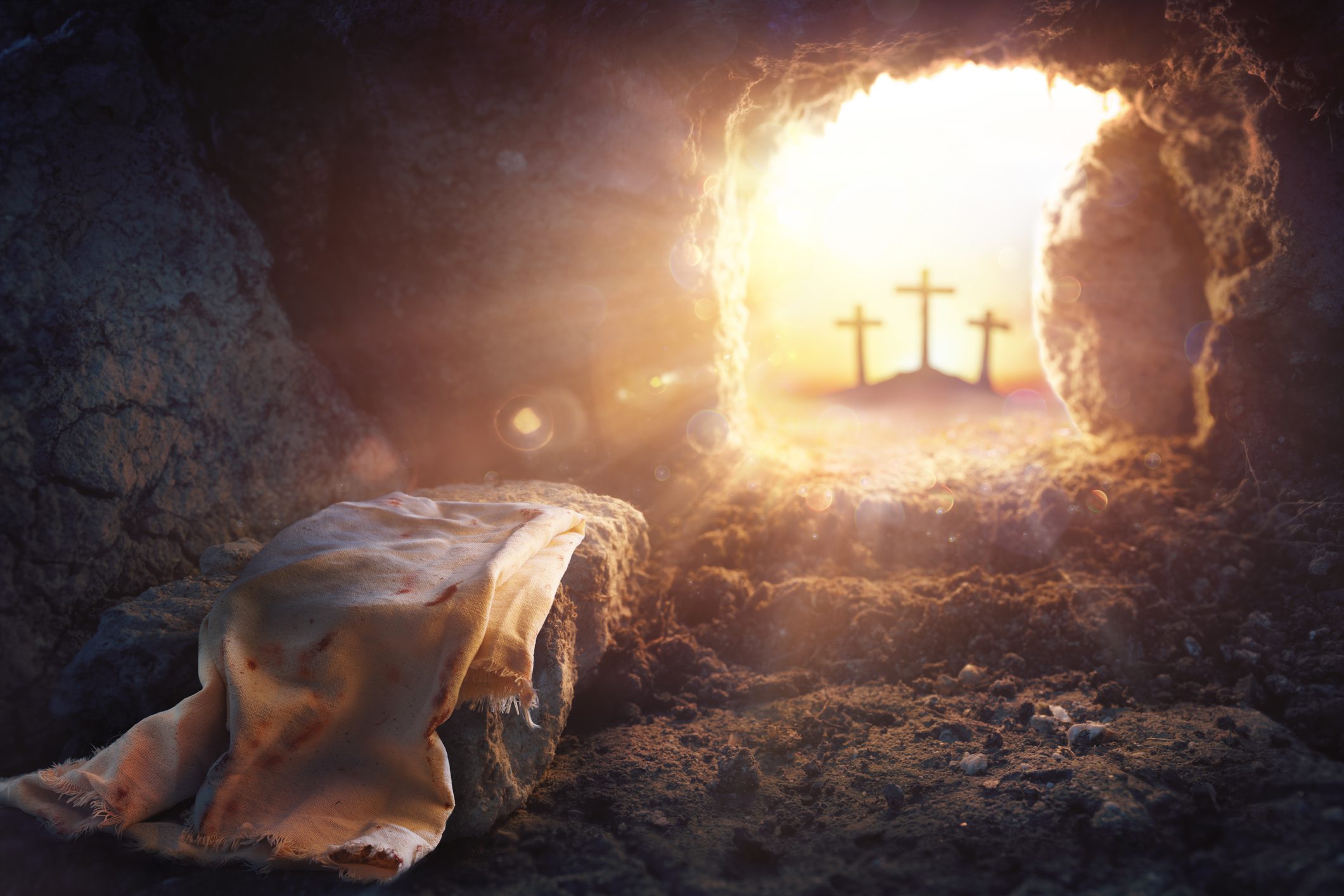Cloth inside tomb, crosses in distance
